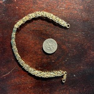 14K yellow gold.  Solid 6.82 grams bracelet